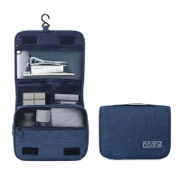 Organizador de Viaje Kingstar, con multiples bolsillos, cerrado 23 x 19 cmts