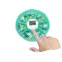 Dispensador de Pastillas con Timer, en PP,  tamaño 11 x 11 x 2.5 cmts,
