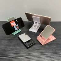 Stand Plastico economico para Celular y Tablet, tamaño cerrado 12 x 6.2 x 1 cmts