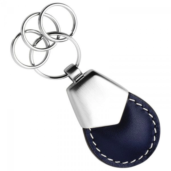 Llavero en cuero 100%, con accesorios y argollas en acero inoxidable, 3 x 4.5 cmts