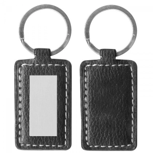 Llavero Fama, en cuero, con accesorio metalico brillante, 5.6 x 3.3 cmts