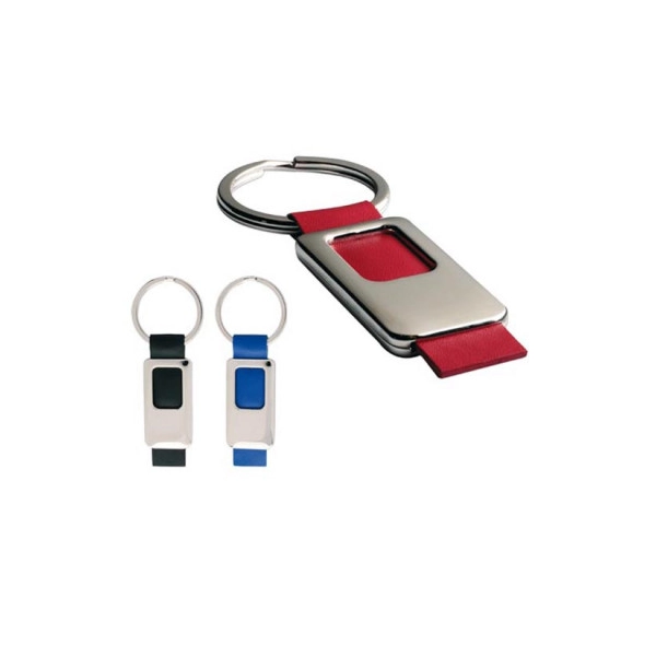 Llavero Pod metalico, con accesorio en imitacion cuero, de 9.5 x 3.5 x 0.5 cmts